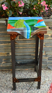 colorful fused glass topped table by karen casey